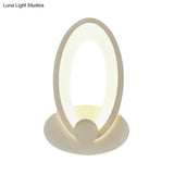 White Egg-Shaped Led Wall Sconce For Bedside Simple Acrylic Style
