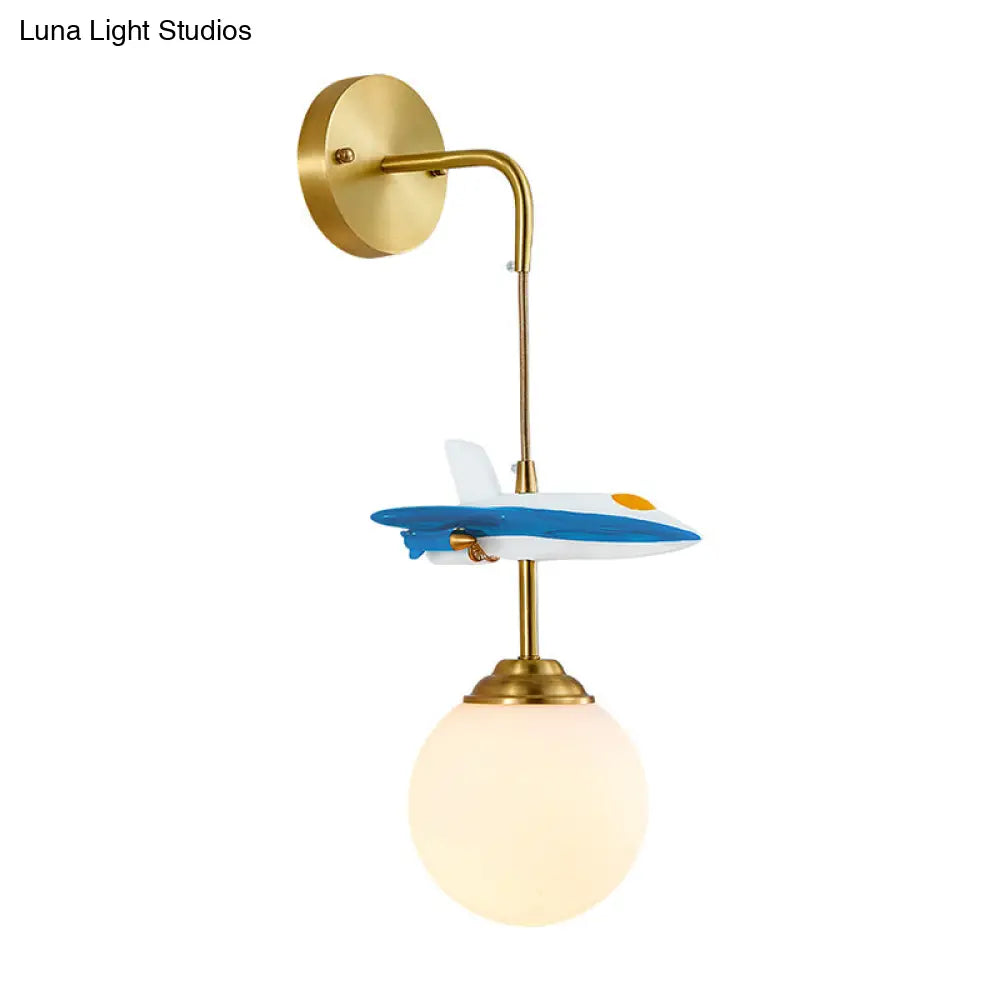 White Glass Globe Wall Light With Cartoon Plane Decor - 1-Light Fixture