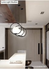 White Glass Pendant Light With Mid-Century Globe Design And Metal Ring