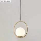 White Glass Pendant Light With Mid-Century Globe Design And Metal Ring