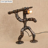 Wrought Iron Vintage Standing Lamp In Bronze With Pipe Man And Bare Bulb - Table Lighting